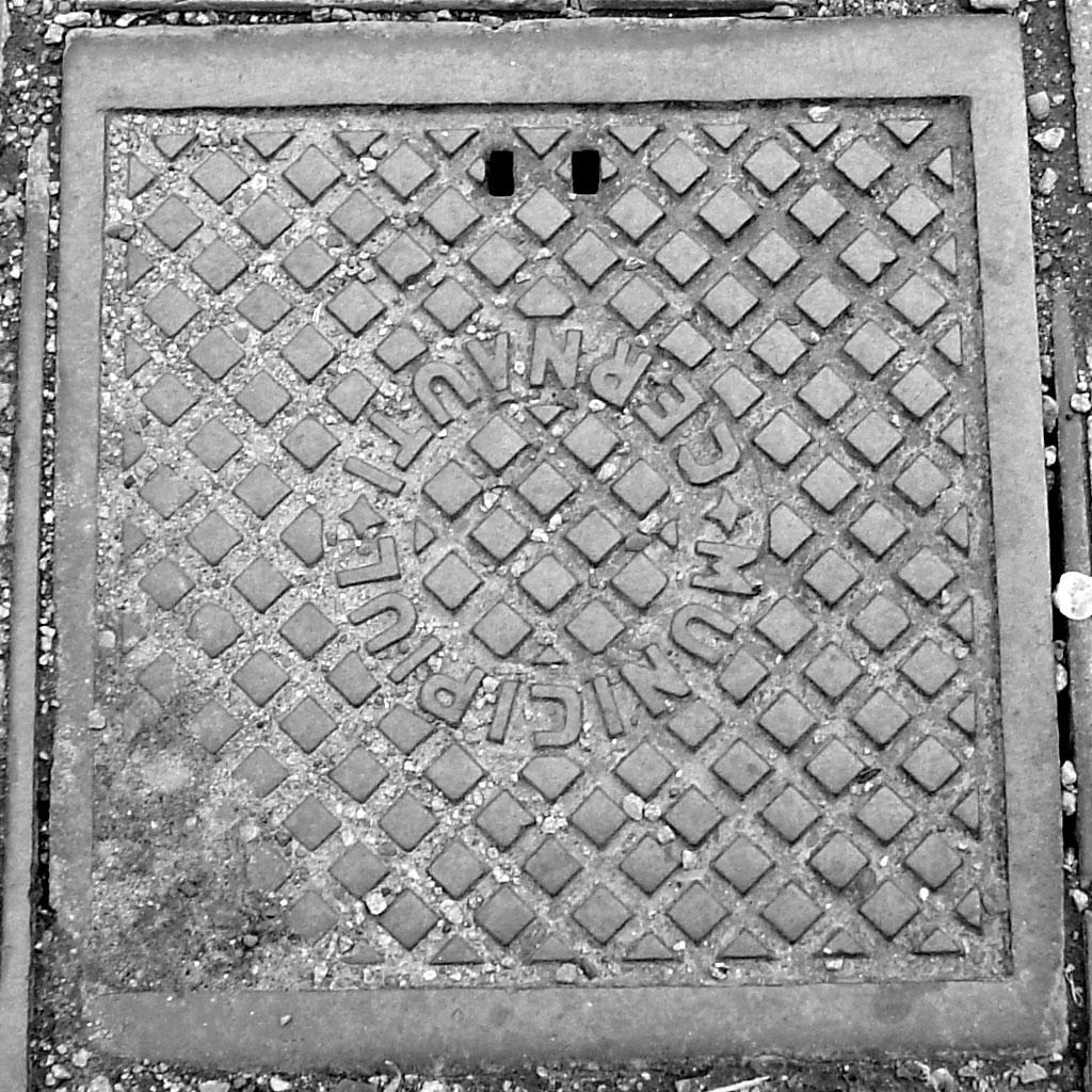 Chernivtsi - manhole from the Romanian periode