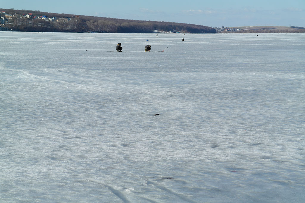 Ternopil - people fishing at the frozen lake