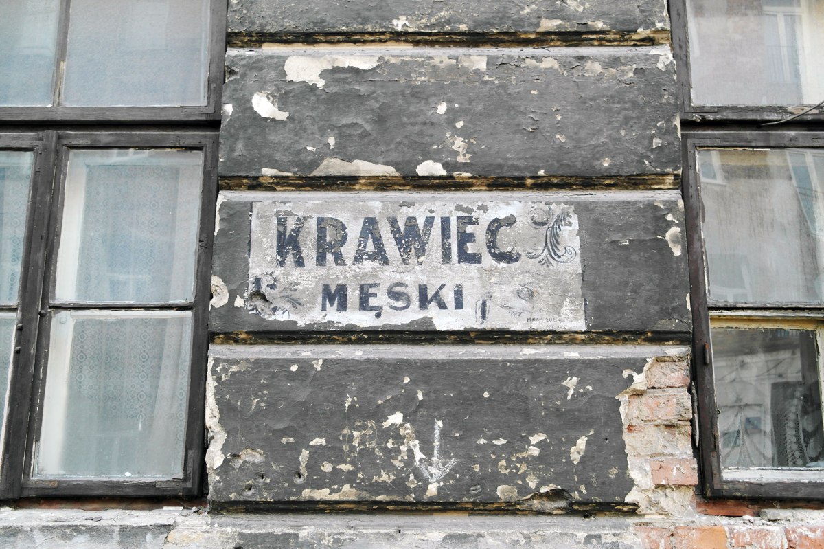 Warsaw - shop sign of a Jewish tailor in Praga