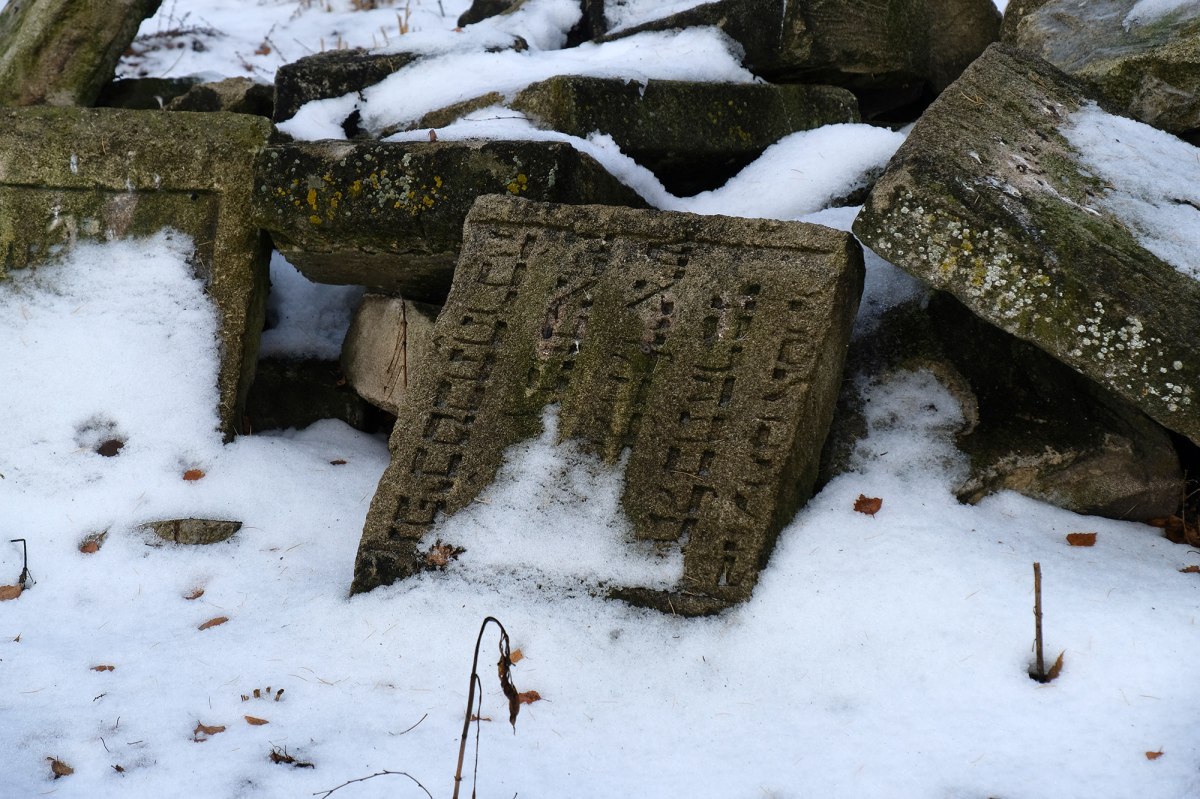 Skalat - returned Jewish tombstones at a mass grave site