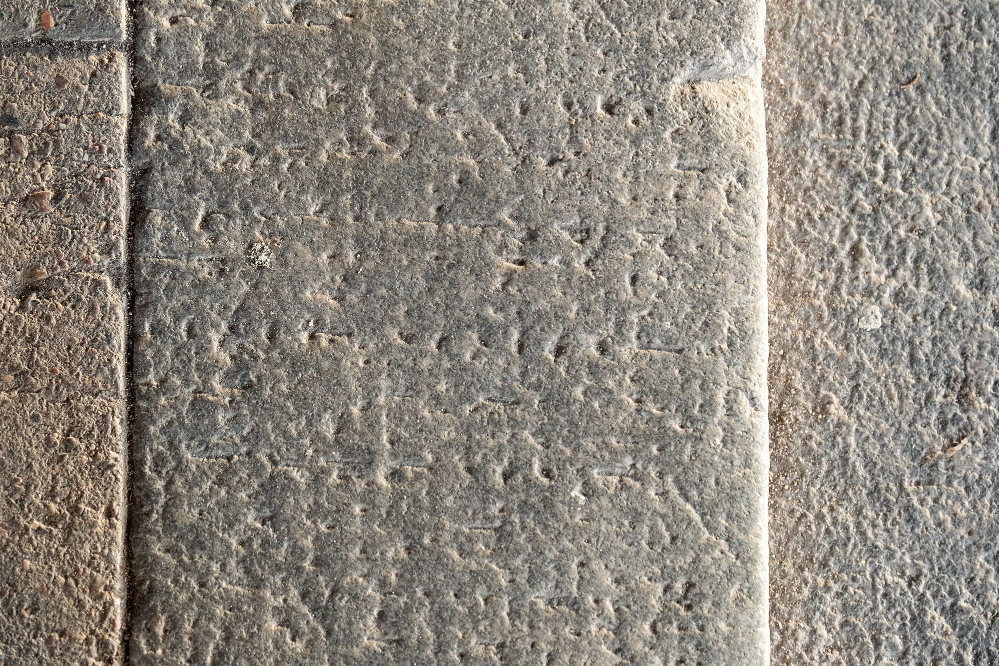 Vilnius - tombstone in the stairs of the Contemporary Art Centre