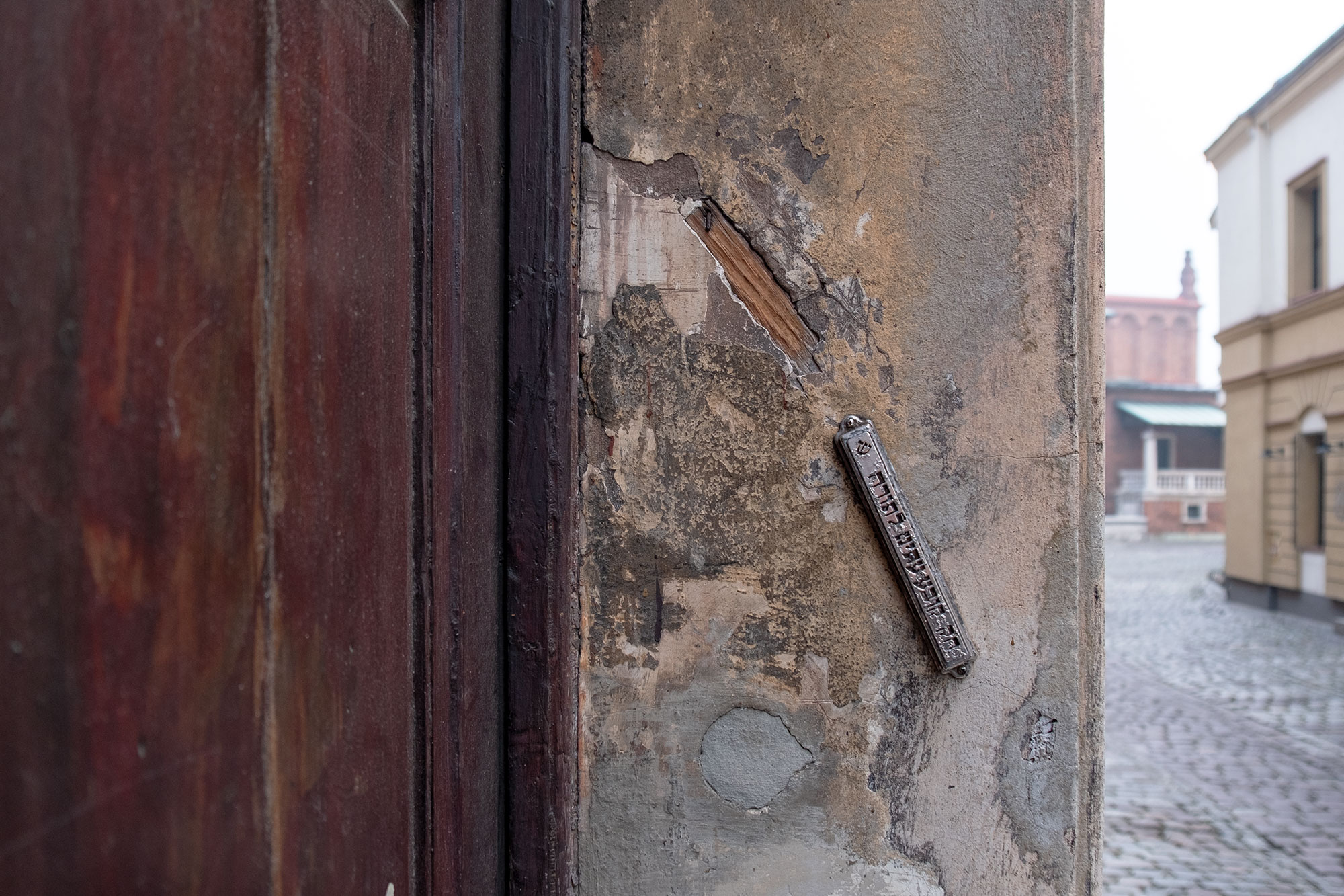 Mezuzah and trace of a mezuzah at the beit midrash in Józefa Street